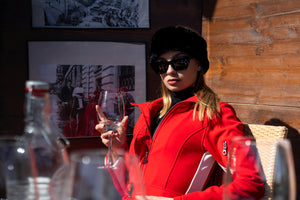 red ski suit, ski trip packing list, ski outfit, snowsuit, red snowsuit, women's ski suit